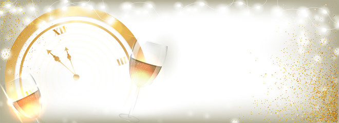 golden clock with wine glasses and lighting garland decorated on background for happy new year celeb