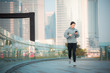 © YiuCheung - Running woman watching on the smartphone