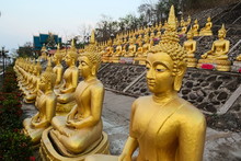 Rows Of Golden Sitting Buddhas In Wat Phu Salao On The Hill, Pakse, Laos.