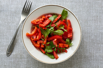 Wall Mural - Vegetable salad with red bell pepper and arugula 