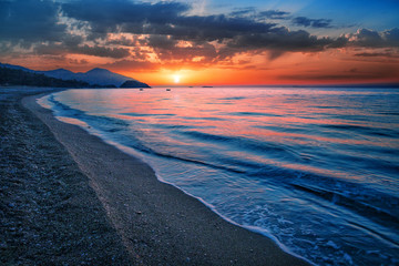 Wall Mural - sea or ocean bay at sunset