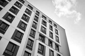 Modern apartment buildings. Facade of a modern apartment building. Black and white.