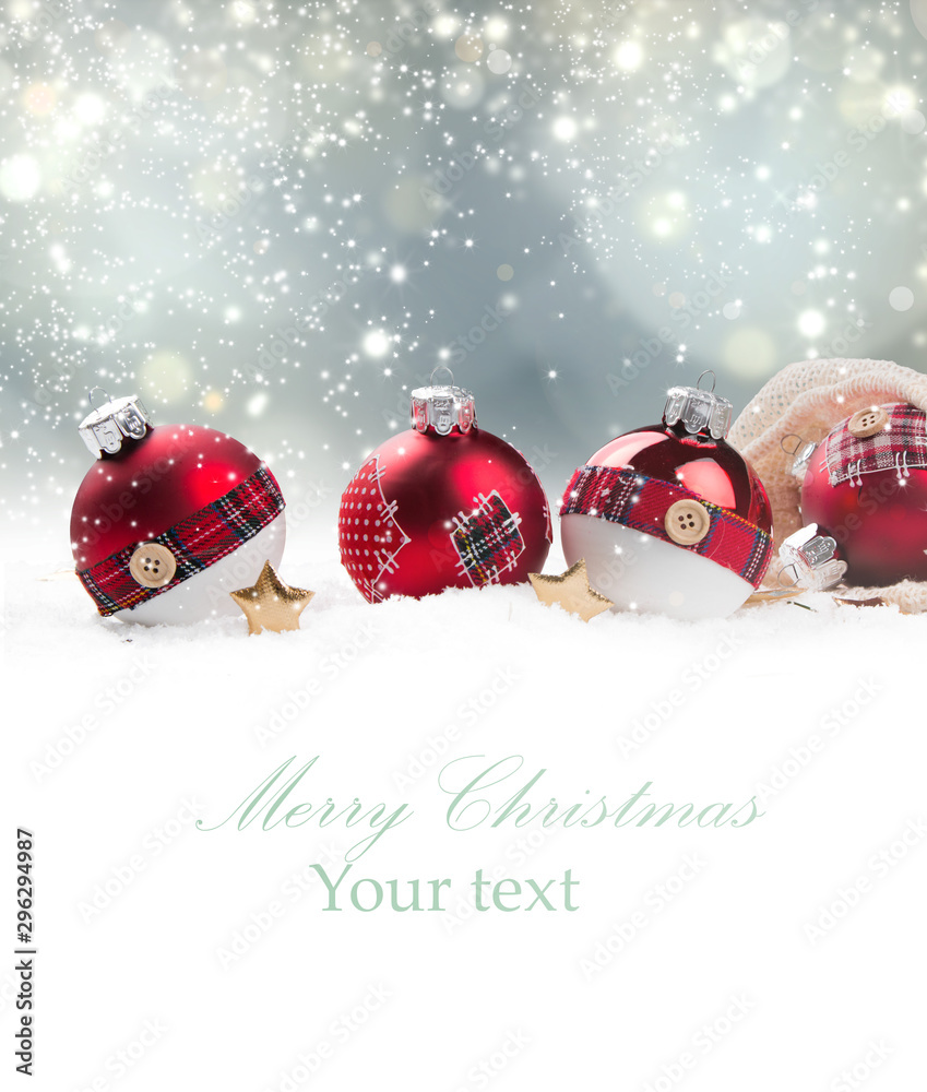 Christmas red ball in snow with blur celebration background.  - obrazy, fototapety, plakaty 