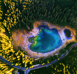 Wall Mural - carezza lake in dolomitesn or lago di carezza, aerial view in the dolomites, south tyrol, italy..