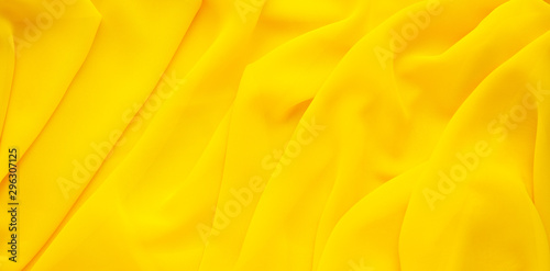 background-from-yellow-silk-fabric-textural-background-of-transparent-and-light-silk-fabric-for-sewing-clothes-panorama-from-textiles