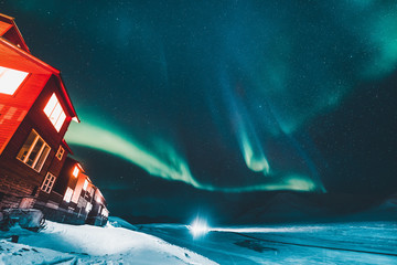 the polar arctic northern lights hunting aurora borealis sky star in norway travel photographer sval