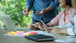 © Prathankarnpap - UX UI concept, Cropped shot Team of Website designer Creative planning application development draft template layout.