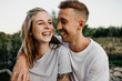 © letizia haessig photography/Westend61 - Portrait of young laughing couple