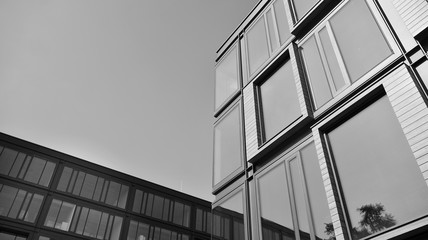 Modern city office building exterior. Black and white.