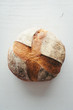 © Ryan Figard - Top angle view of Italian bread loaf on isolated background