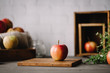 © Ryan Figard - Apple on wooden cutting board