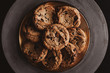 © Ryan Figard - Close up of chocolate chip cookies served on plate