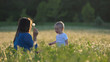 © MEDIAIMAG - Mother and son having good time in nature