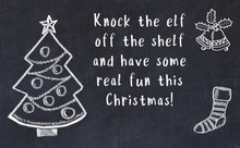 Drawing Of Christmas Tree And Handwritten Greetings On Black Chalkboard 