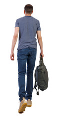 Poster - back view of walking man with green bag.