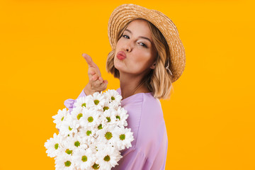 Sticker - Image of adorable woman in elegant dress and straw hat holding flowers