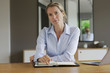 © goodluz - portrait of a businesswoman in an office
