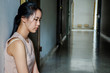 © TeTe Song - depression young girl teenager having abused problem feeling suffering sitting alone in the dark room, Domestic violence, family problems, Stress, violence, The concept of depression and suicide..