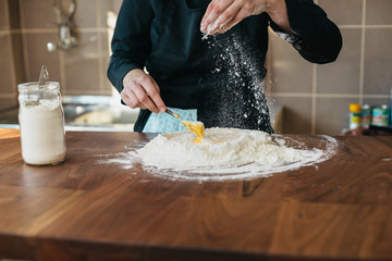 Wall Mural - Chef making fresh pasta in the kitchen