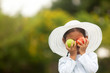 © prasit - Little girl holding apples in the garden