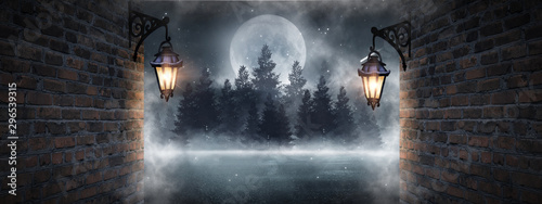 Fotografía Dark street, a lantern on an old brick wall, a large moon, smoke, smog