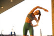 © Drobot Dean - Image of seductive athletic woman doing exercises while working out