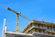 © Unkas Photo - Crane and highrise construction site