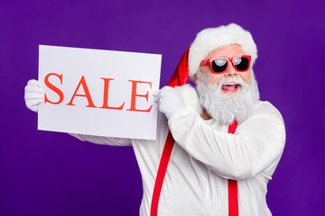 Sticker - Close-up portrait of his he nice cheery glad cheerful positive bearded Santa demonstrating placard SALE gift presents surprise isolated over bright vivid shine vibrant violet lilac background