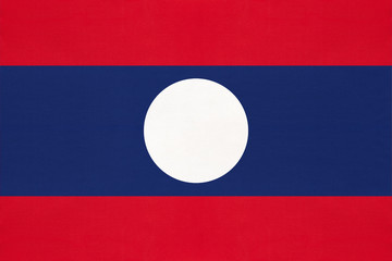 Laos national fabric flag, textile background. Symbol of Asian world country.