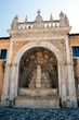 A monumental ancient fountain in the courtyard of the charterhouse of Padula, Salerno, Italy