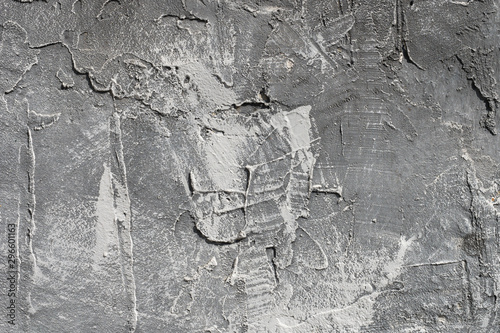 Fotografía The texture of gypsum or alibaster cracked plaster on the wall is a thick layer