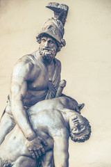 Canvas Print - Menelaus supporting the body of Patroclus, in the Loggia dei Lanzi, Florence, Italy. Renaissance marble statue sculptures that copy a Hellenistic bronze original, dating to ca. 200–150 BCE