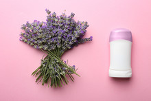 Female Deodorant And Lavender Flowers On Pink Background, Flat Lay