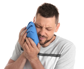 Wall Mural - Man suffering from toothache on white background