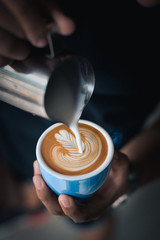 Wall Mural - coffee latte art make by barista