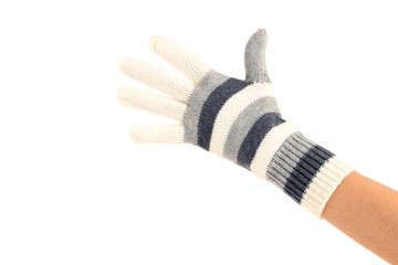 Sticker - Hand in knitted mitten on white background