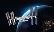 ISS space station on orbit of the Earth planet. Blue light on background. Elements of this image furnished by NASA