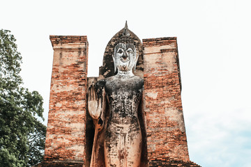 Wall Mural - Sukhothai Historical Park in Thailand Sukhothai historical park. Buddhist temple ruins Wat Maha That or the Monastery of the Great Relic is