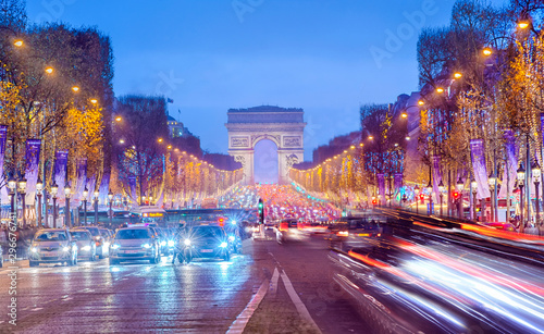 Arch of Triumph and Champs Elysees in Paris at night, France Tableau sur Toile
