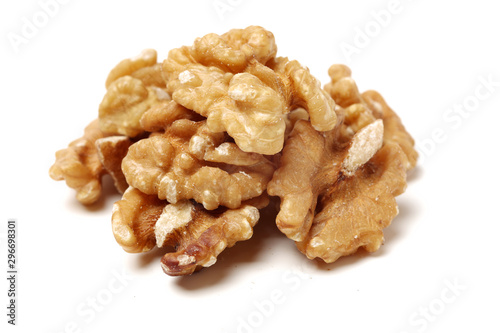 Fotografía Half peeled walnut closeup isolated on white background