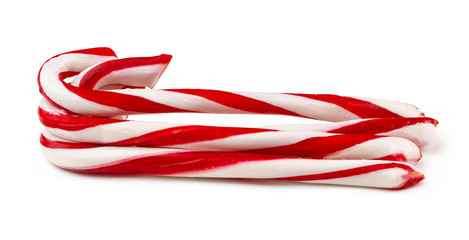 Stack of candy canes isolated on white background