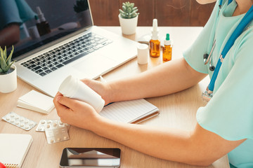 Wall Mural - Female medicine doctor filling patient medical form or prescription