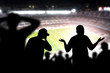© terovesalainen - Sad football fans. Disappointed, angry and upset crowd in a match in a soccer stadium. Favourite team and club lost game. Devastated audience in live sport event. Angry silhouette people watching.