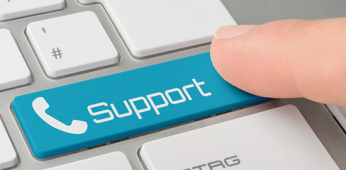 Wall Mural - a keyboard with a blue labeled button - support
