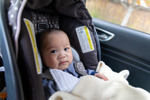 Cute Asian Baby In Child Car Seat Going For A Family Road Trip