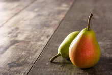 Two Pears On Wooden Table. Copy Space