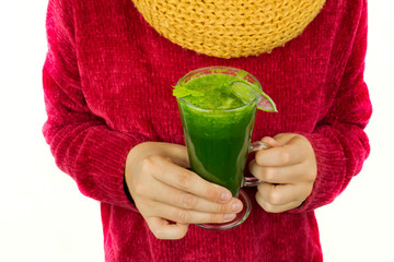 green antioxidant juice,woman with glass of vegetable juice smiling and white background,alternative modern medicine,