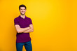 Portrait of his he nice attractive cheerful cheery content brown-haired guy folded arms copy space isolated over bright vivid shine vibrant yellow color background