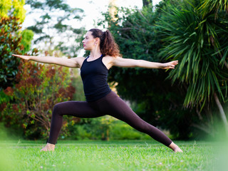 Woman doing yoga in park