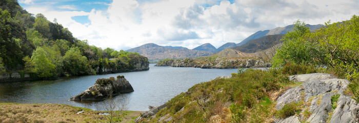 Panoramic view at lake and mountain of  Killarney National Park on the Ring of Kerry in Ireland. Amazing scenic aerial of a natural irish countryside landscape. Part of the Wild Atlantic Way.